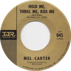hold me, thrill me, kiss me